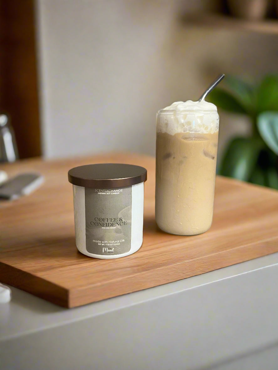Iced coffee with a canister on a countertop next to a coffee machine.